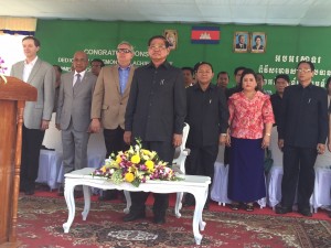 General Overseer Mark Williams, far left, and PCL Director Fred Garmon, third from left, are joined by Cambodian dignitaries for the Build a City Phase II dedication (click on photo to enlarge). 